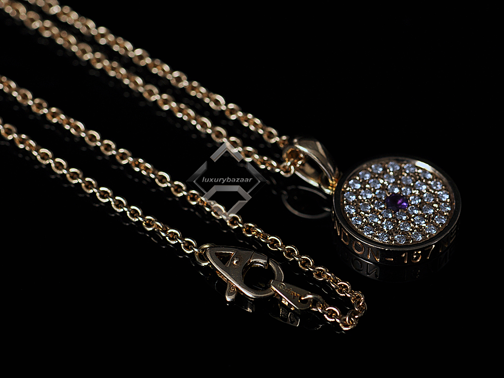 Dimensions: Length of the necklace is 18 inches, width of the pendant ...